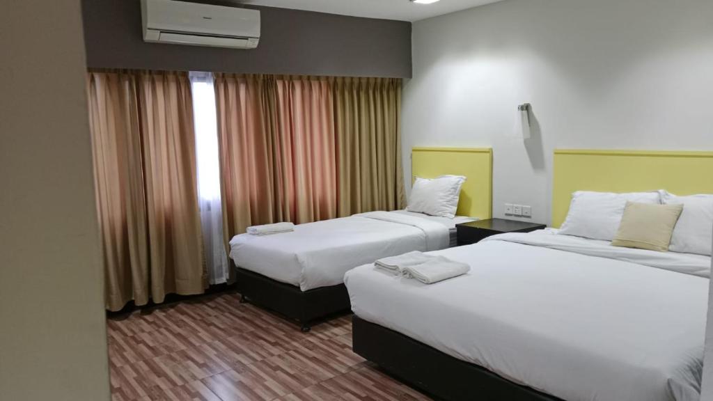 Kamar hotel premium di Balikpapan yang bersih dan nyaman